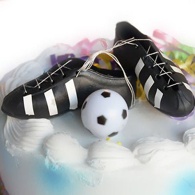 soccer cleats and ball